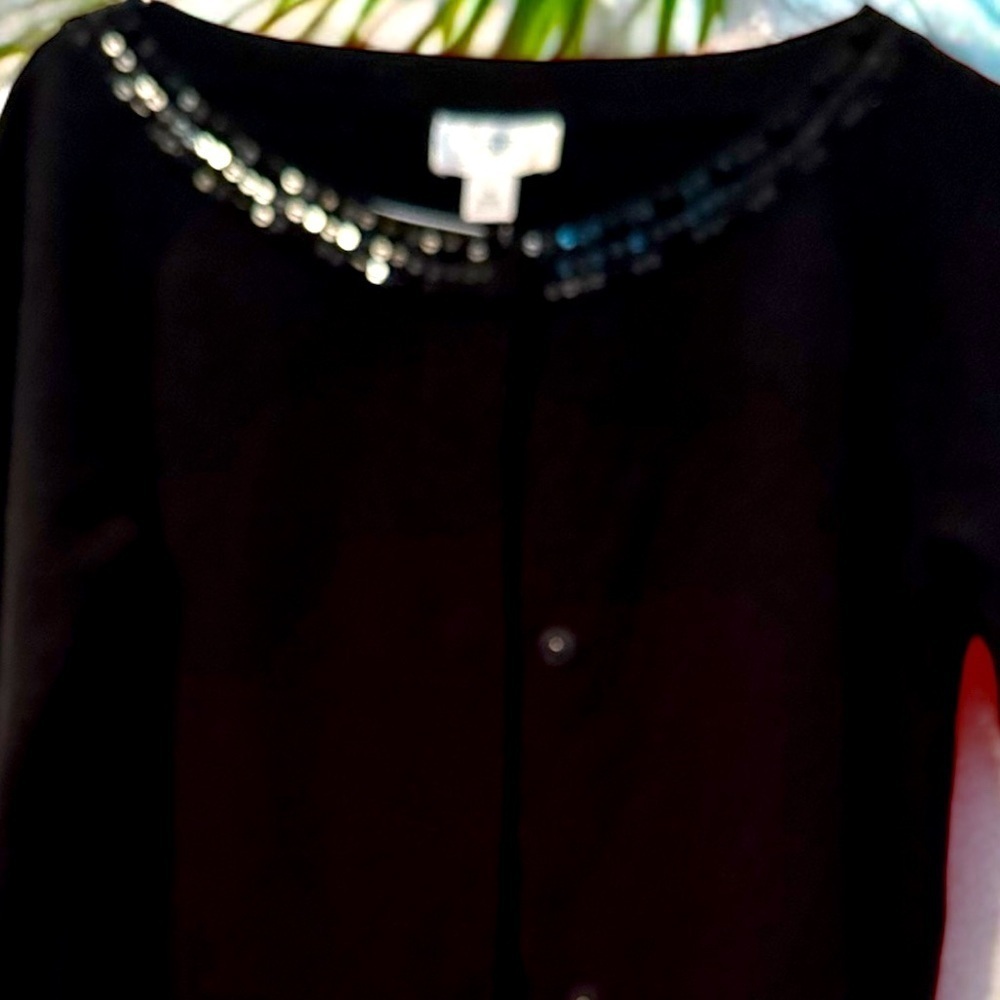 Talbots size medium with sparkle stone neckline . Very pretty layering sweater